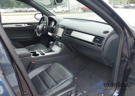 2014 Volkswagen Touareg 3.6L R-Line z USA, uszkodzony, nr VIN WVGDF9BP8ED015095